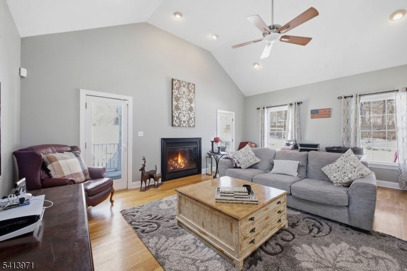 115 Mt Lebanon Road Glen Gardner, NJ 08826 - Photo 15 of 49 a living room with furniture and a fireplace