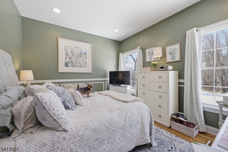115 Mt Lebanon Road Glen Gardner, NJ 08826 - Photo 20 of 49 a bedroom with a bed and furniture
