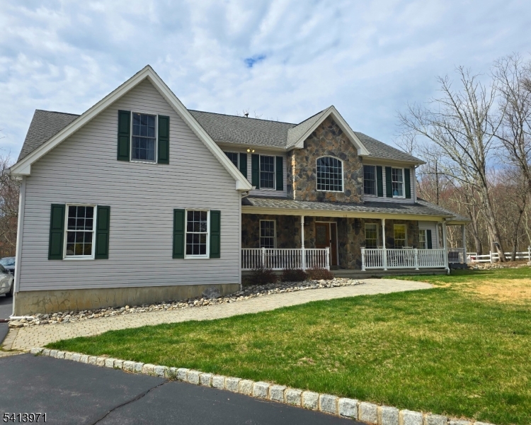 115 Mt Lebanon Road Glen Gardner, NJ 08826 - Photo 2 of 49 a front view of a house with a yard