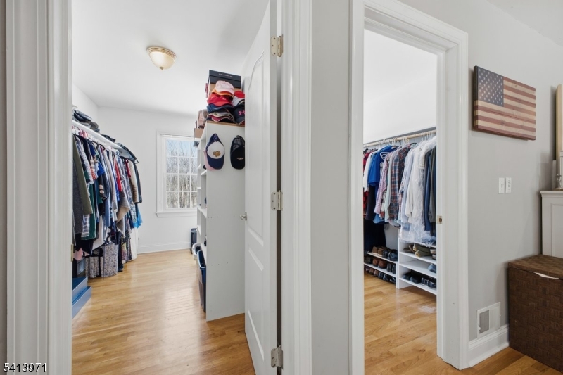 115 Mt Lebanon Road Glen Gardner, NJ 08826 - Photo 26 of 49 a view of walk in closet with clothes and shoes