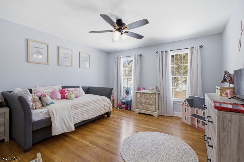 115 Mt Lebanon Road Glen Gardner, NJ 08826 - Photo 34 of 49 a bedroom with a bed and a couch