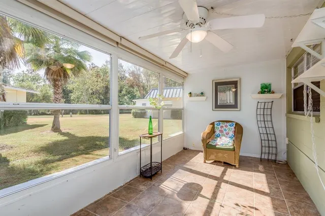 a view of living room filled with furniture