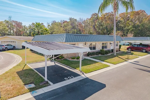 swimming pool with outdoor seating and plants
