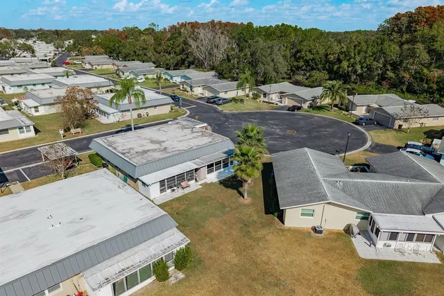 an aerial view of a house with a garden