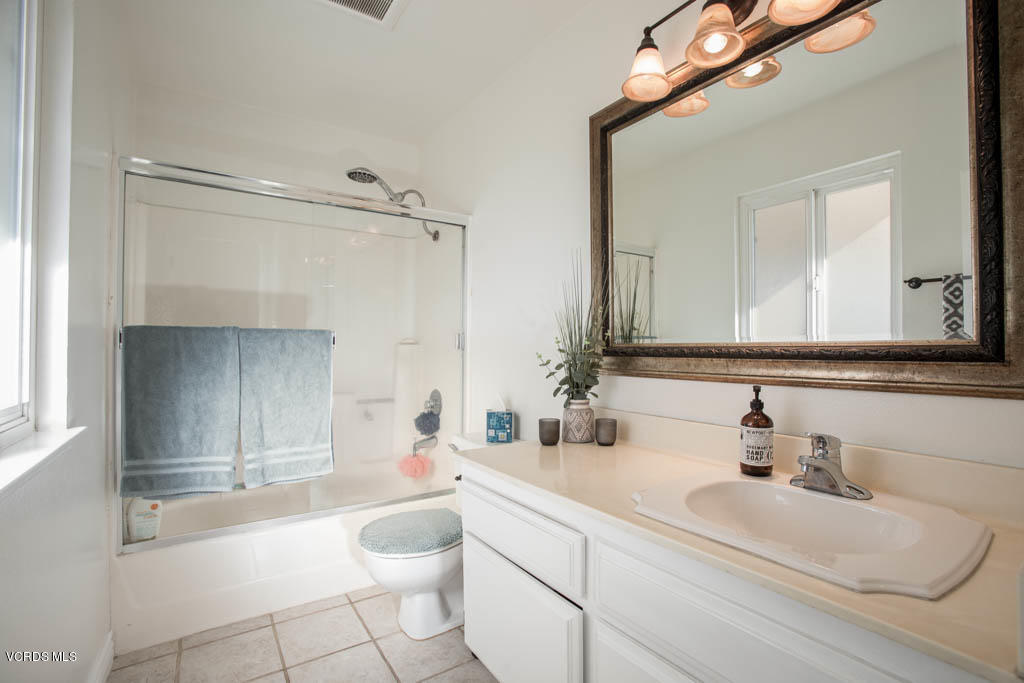 4713 Avedon Road Moorpark, CA 93021 - Photo 22 of 33 a bathroom with a sink a toilet and shower