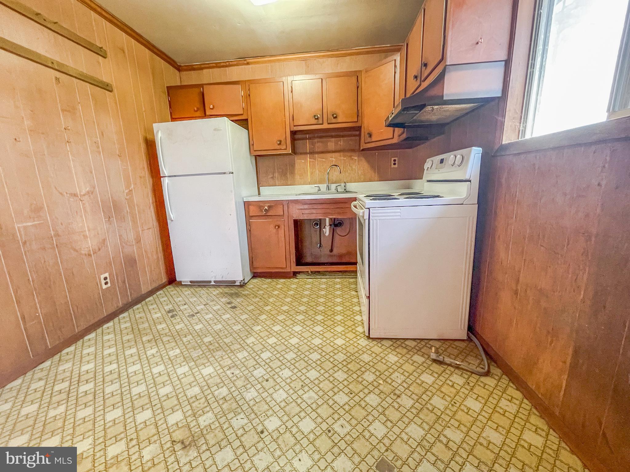 12403 Ridge Road Lusby, MD 20657 - Photo 11 of 16 Lots of space to expand the kitchen area.