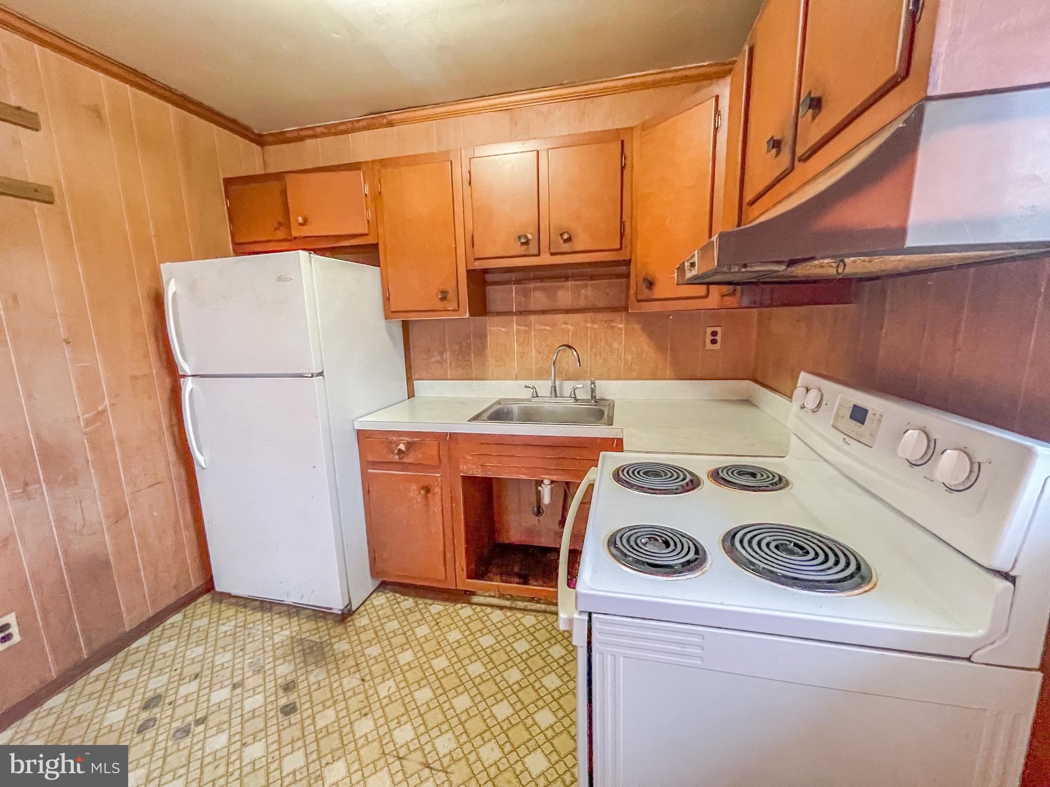 12403 Ridge Road Lusby, MD 20657 - Photo 12 of 16 Lots of cabinets provide good storage.