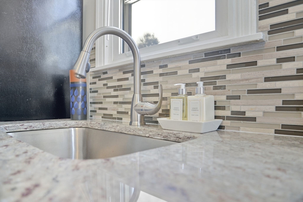 118 Pilgrim Road Springfield, MA 01118 - Photo 6 of 24 a view of a living room with a sink