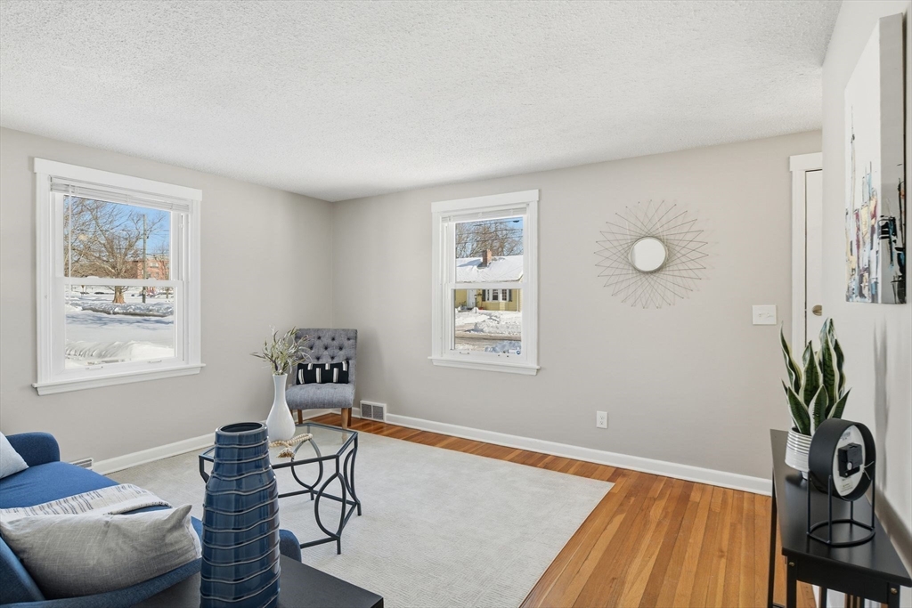 118 Pilgrim Road Springfield, MA 01118 - Photo 8 of 24 a workspace with furniture and window
