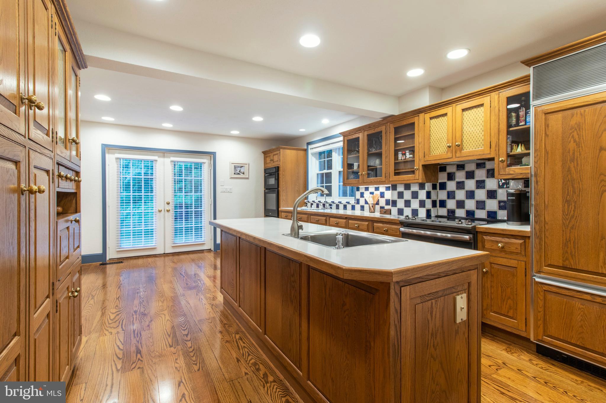 1118 Coventry Road Cheltenham, PA 19012 - Photo 12 of 59 Oversized kitchen with random width hardwood floor
