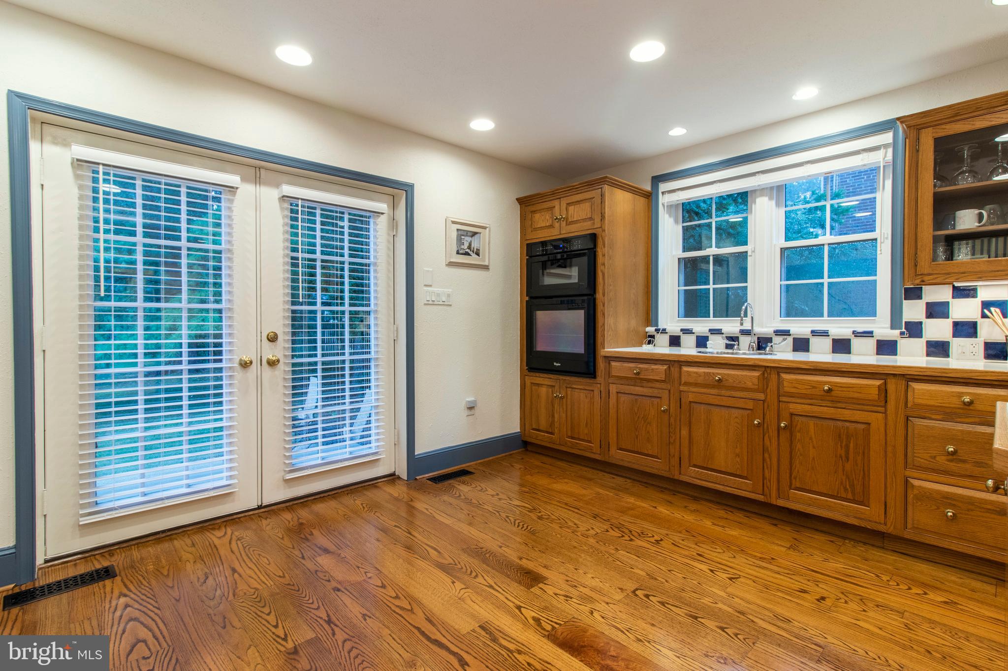 1118 Coventry Road Cheltenham, PA 19012 - Photo 14 of 59 Glass french doors open out to large patio
