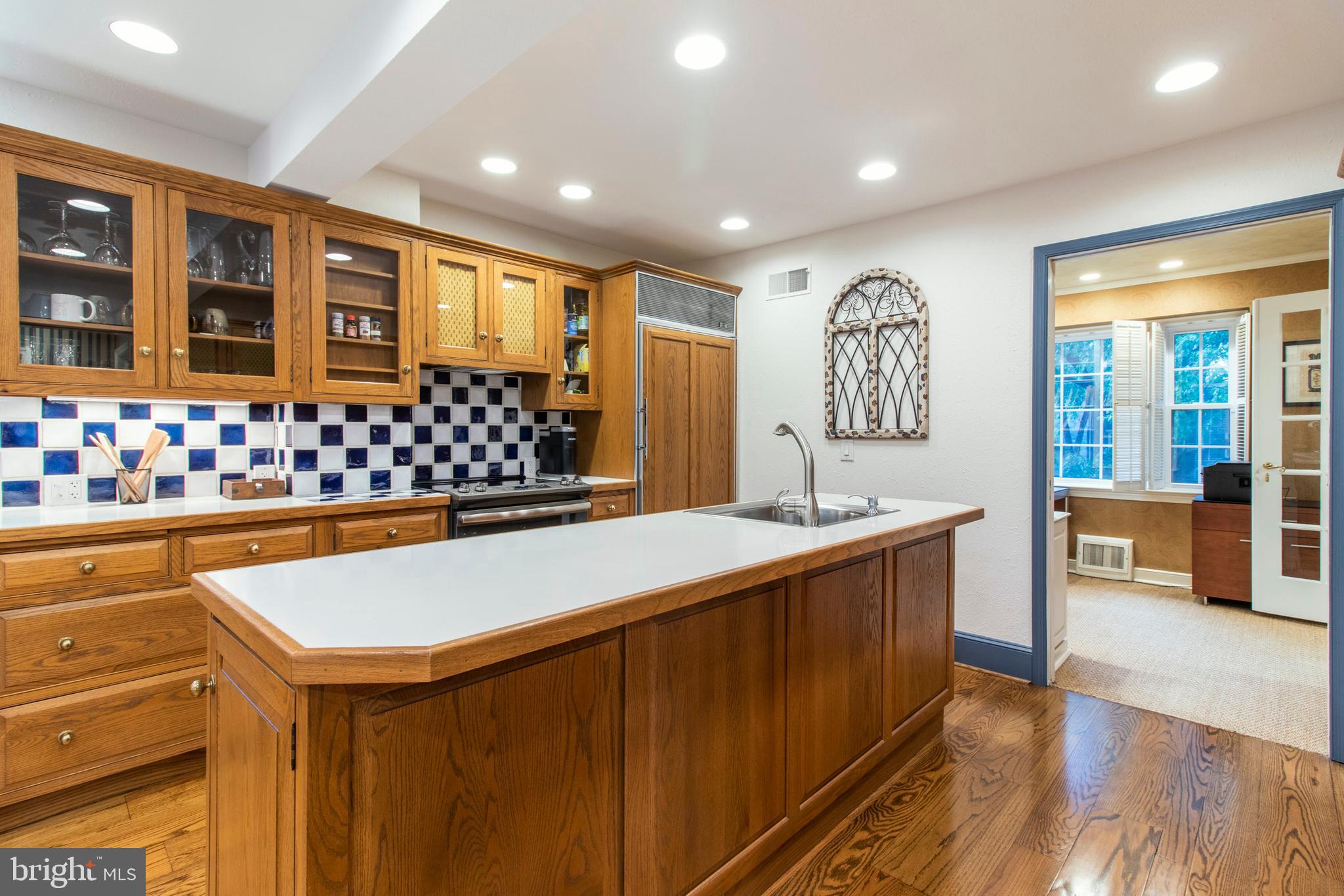 1118 Coventry Road Cheltenham, PA 19012 - Photo 16 of 59 Striking wood cabinetry blended w/ tile backsplash