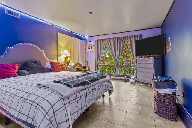 a room with a sink and a mirror