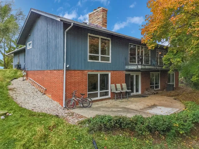 a backyard of a house with seating space