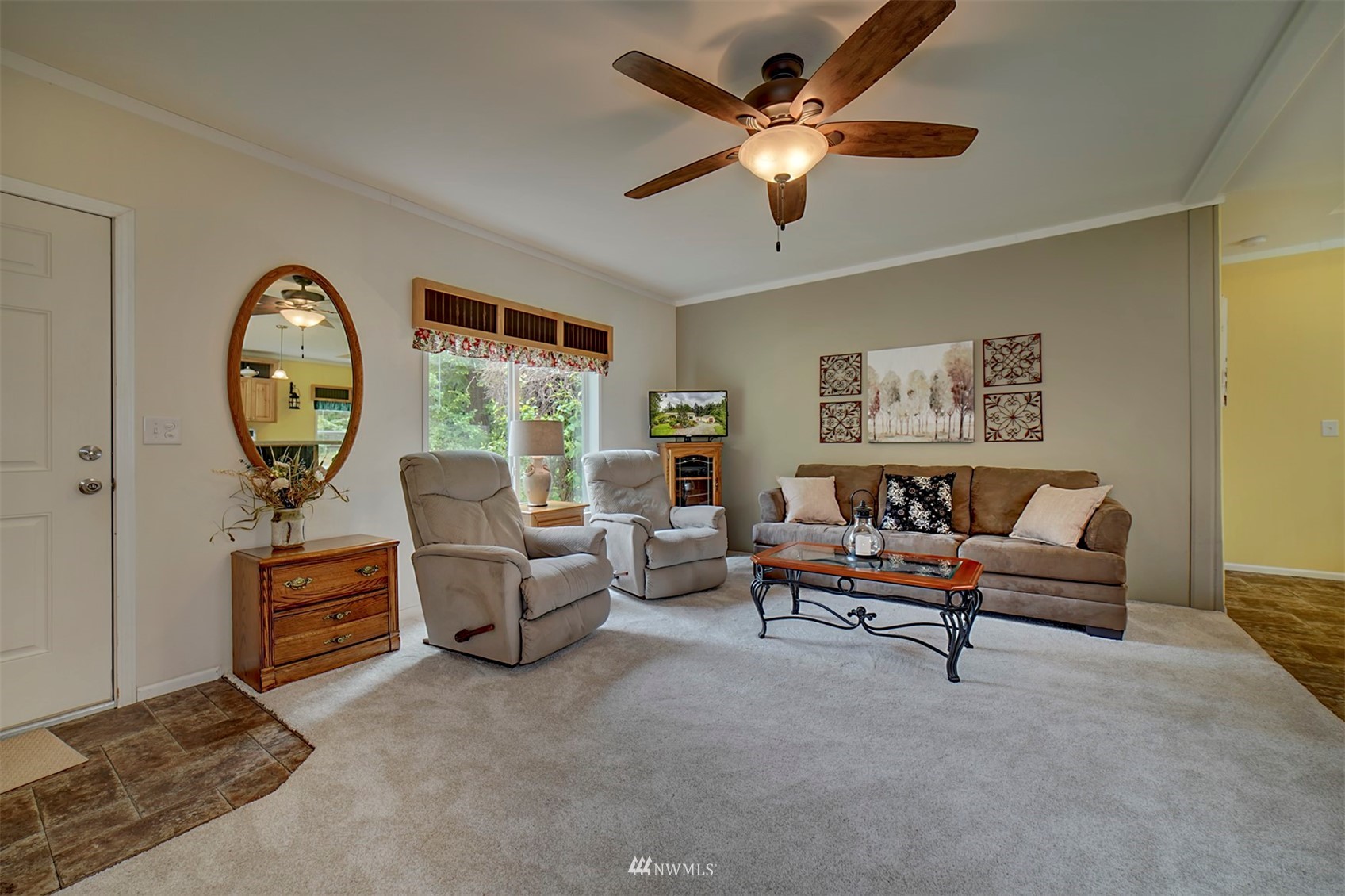 415 Port Hadlock Heights Road Port Hadlock, WA 98339 - Photo 8 of 39 a living room with furniture and a large window