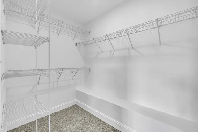 a view of a room with racks on the wall