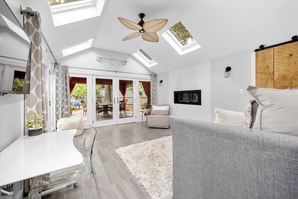 3 Howland Lane Hingham, MA 02043 - Photo 12 of 42 a living room with furniture and a flat screen tv