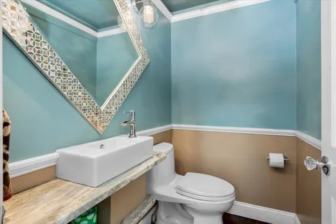 a bathroom with a sink and toilet