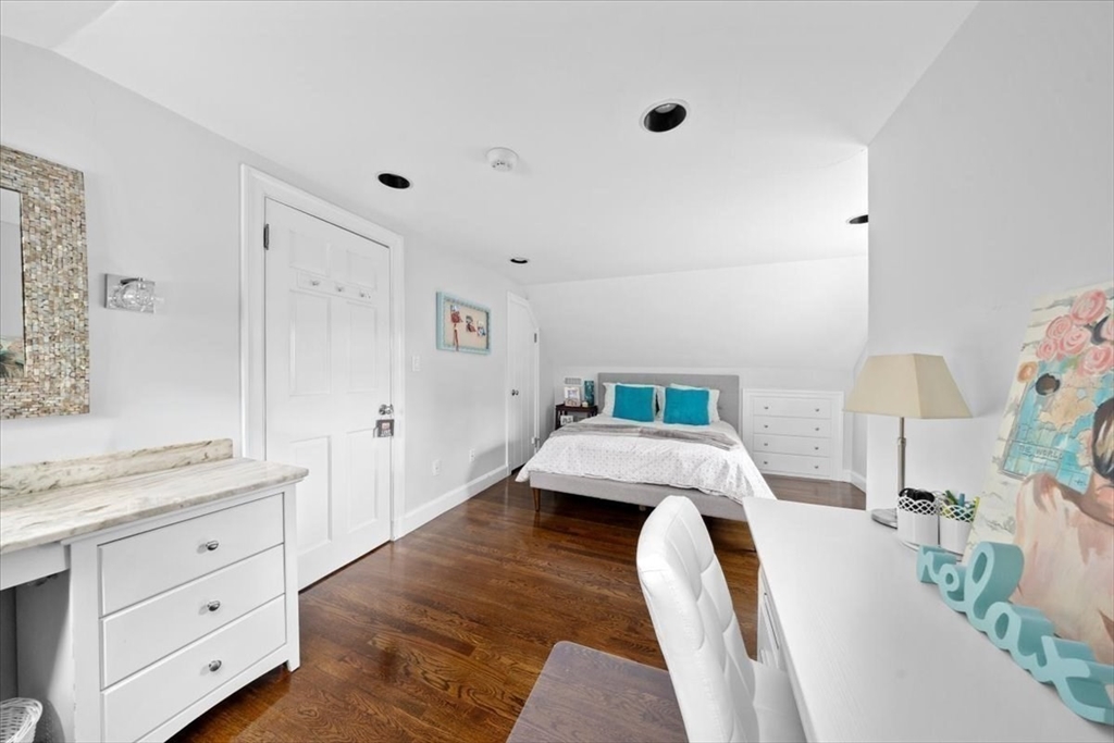 3 Howland Lane Hingham, MA 02043 - Photo 20 of 42 a bed room with a bed and a dresser