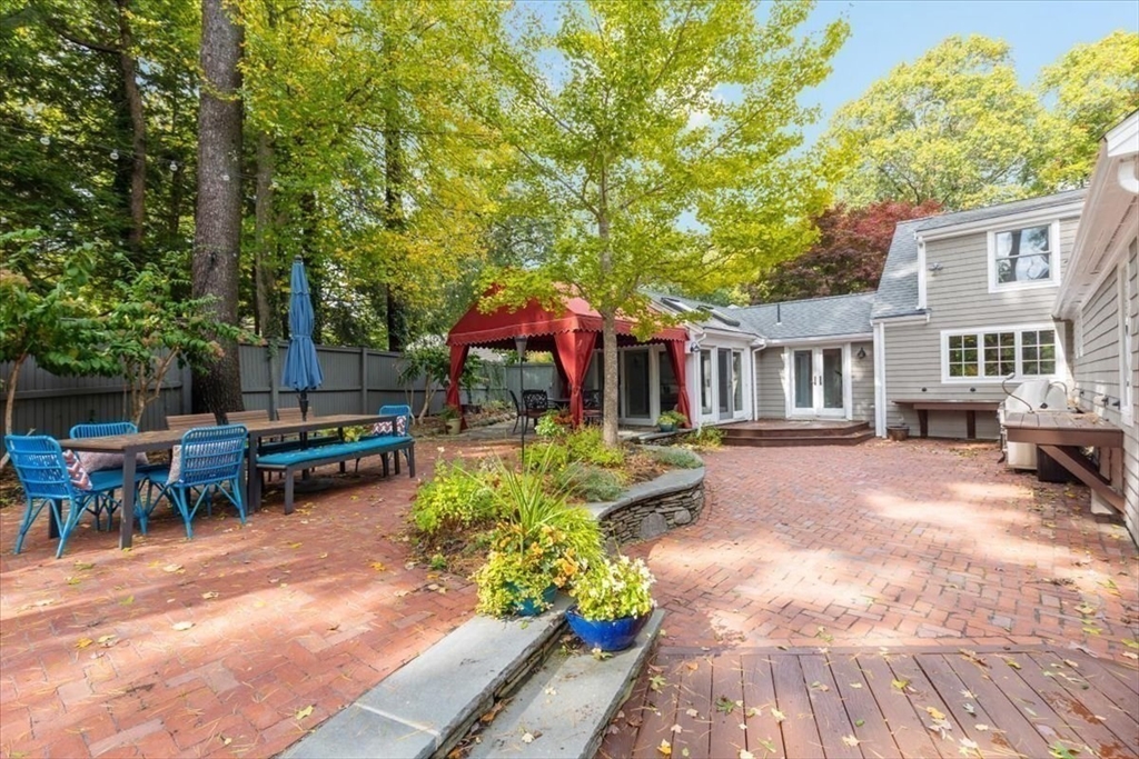 3 Howland Lane Hingham, MA 02043 - Photo 24 of 42 a view of a house with a yard and sitting area