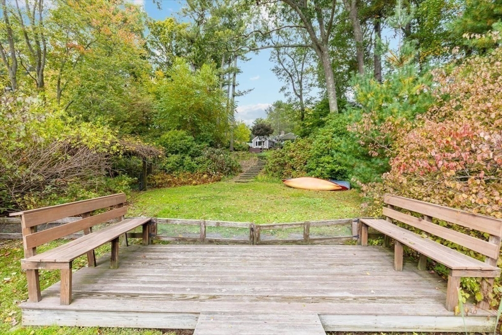 3 Howland Lane Hingham, MA 02043 - Photo 31 of 42 a view of a swimming pool with a lawn chairs and plants