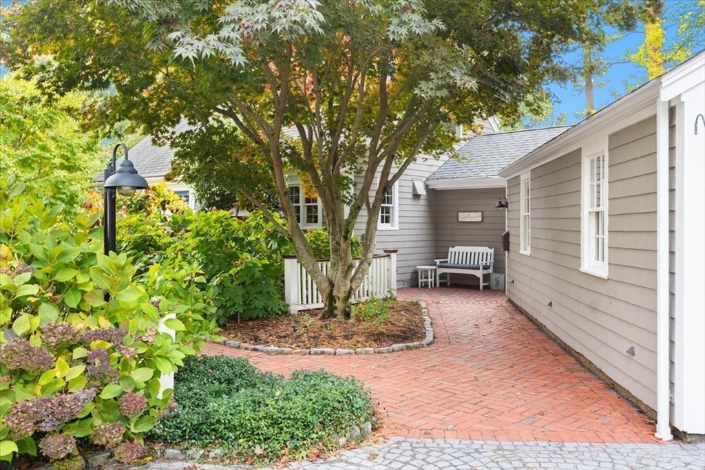 3 Howland Lane Hingham, MA 02043 - Photo 37 of 42 a view of a backyard with a large tree