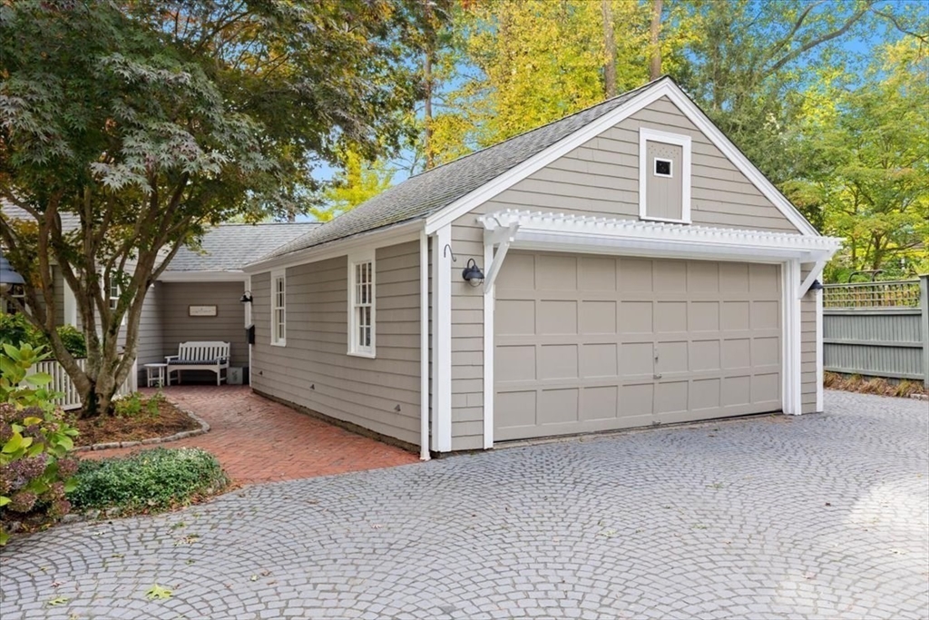 3 Howland Lane Hingham, MA 02043 - Photo 39 of 42 a view of a house with a yard and garage