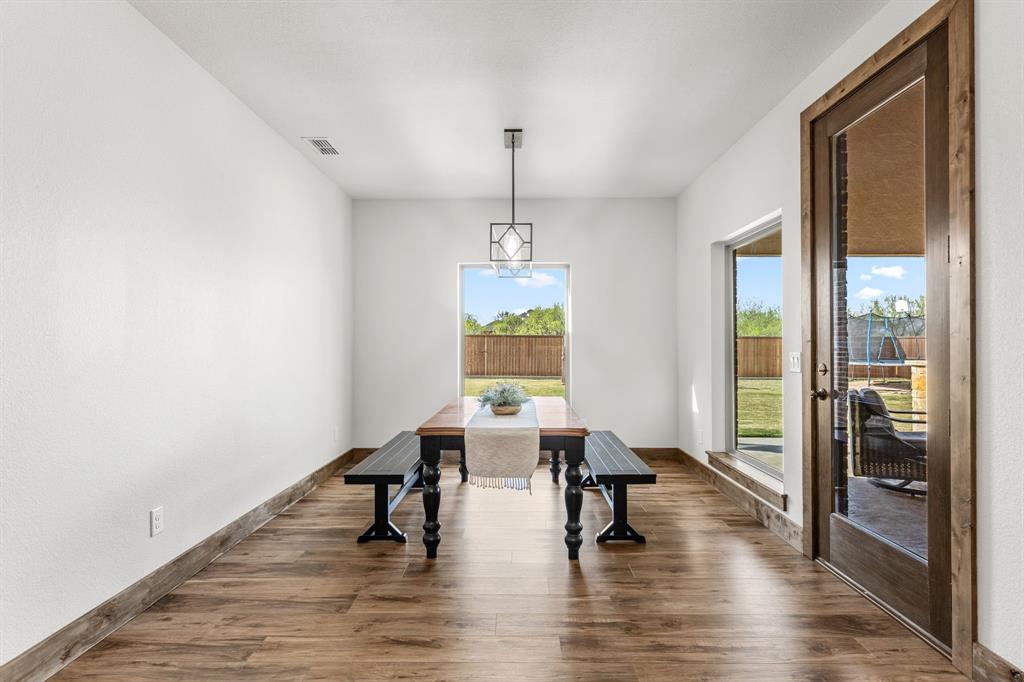 515 Sales Road Windthorst, TX 76389 - Photo 11 of 34 a view of a livingroom with furniture window and wooden floor