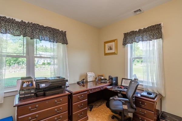 135 Marion Road Middleboro, MA 02346 - Photo 11 of 30 a view of a workspace with furniture and a window