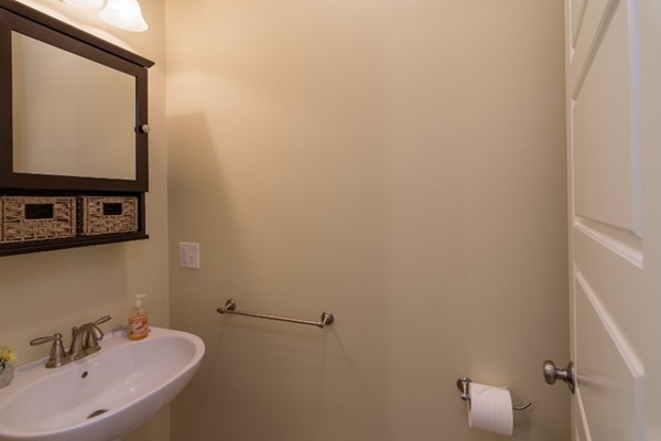 135 Marion Road Middleboro, MA 02346 - Photo 12 of 30 a bathroom with a sink and mirror