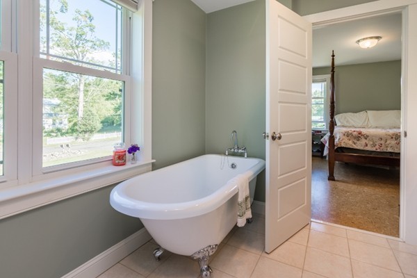 135 Marion Road Middleboro, MA 02346 - Photo 15 of 30 a spacious bathroom with a tub and shower