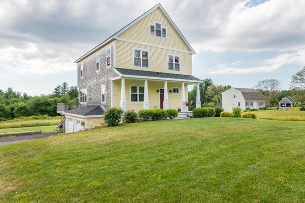135 Marion Road Middleboro, MA 02346 - Photo 24 of 30 a front view of a house with garden