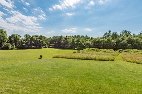 135 Marion Road Middleboro, MA 02346 - Photo 28 of 30 a view of a lake with a big yard