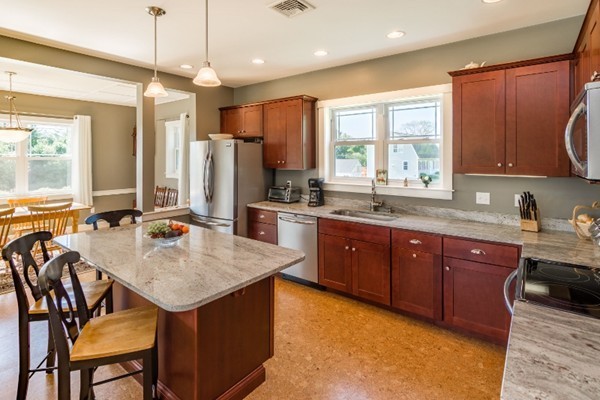 135 Marion Road Middleboro, MA 02346 - Photo 4 of 30 a kitchen with a sink stove and refrigerator