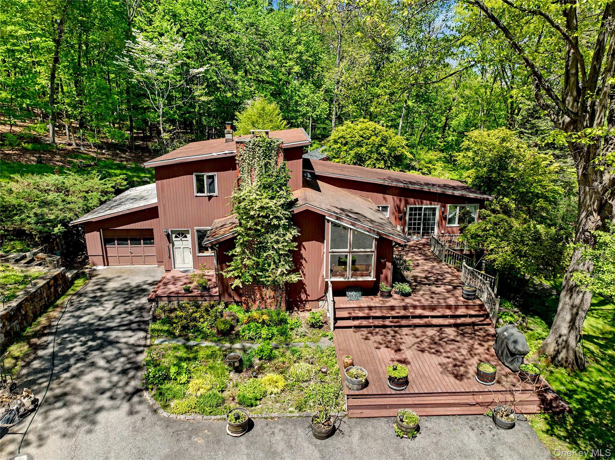 631 Croton Falls Road Carmel, NY 10512 - Photo 1 of 43 front view of a house with a yard