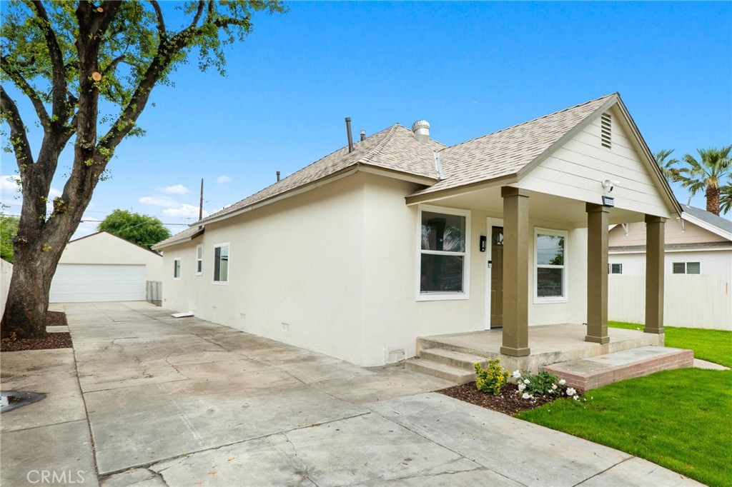 3882 Taft Street Riverside, CA 92503 - Photo 32 of 37 a front view of a house with a yard