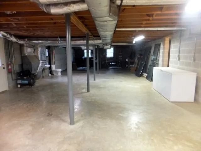 a view of a hallway with seating space