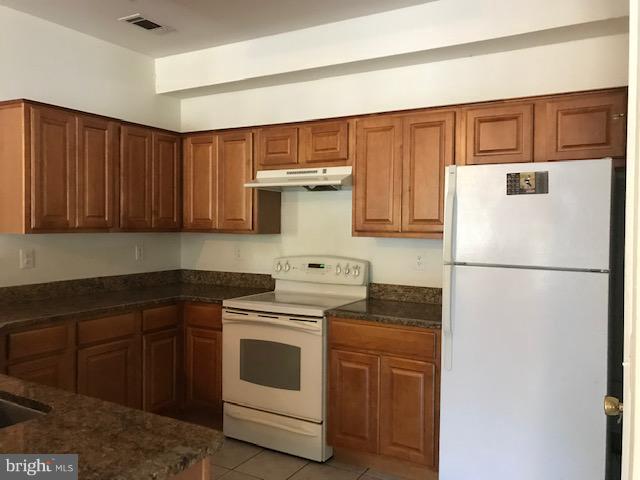 1530 Spring Gate Dr., Unit 9117 McLean, VA 22102 - Photo 7 of 15 Kitchen