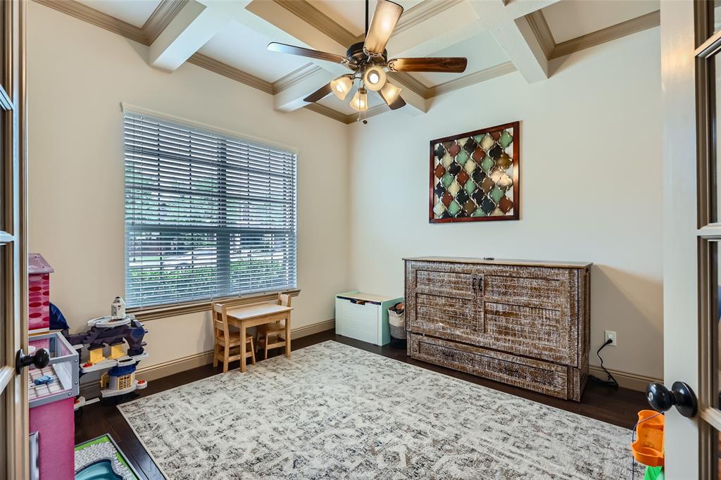 813 Goose Court Forney, TX 75126 - Photo 12 of 28 a room with furniture and window