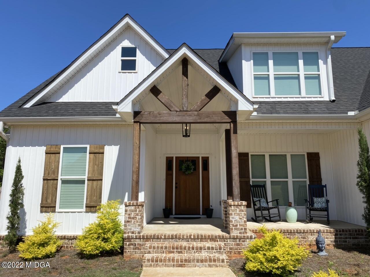 101 Carters Way Forsyth, GA 31029 - Photo 2 of 28 a front view of a house with a yard