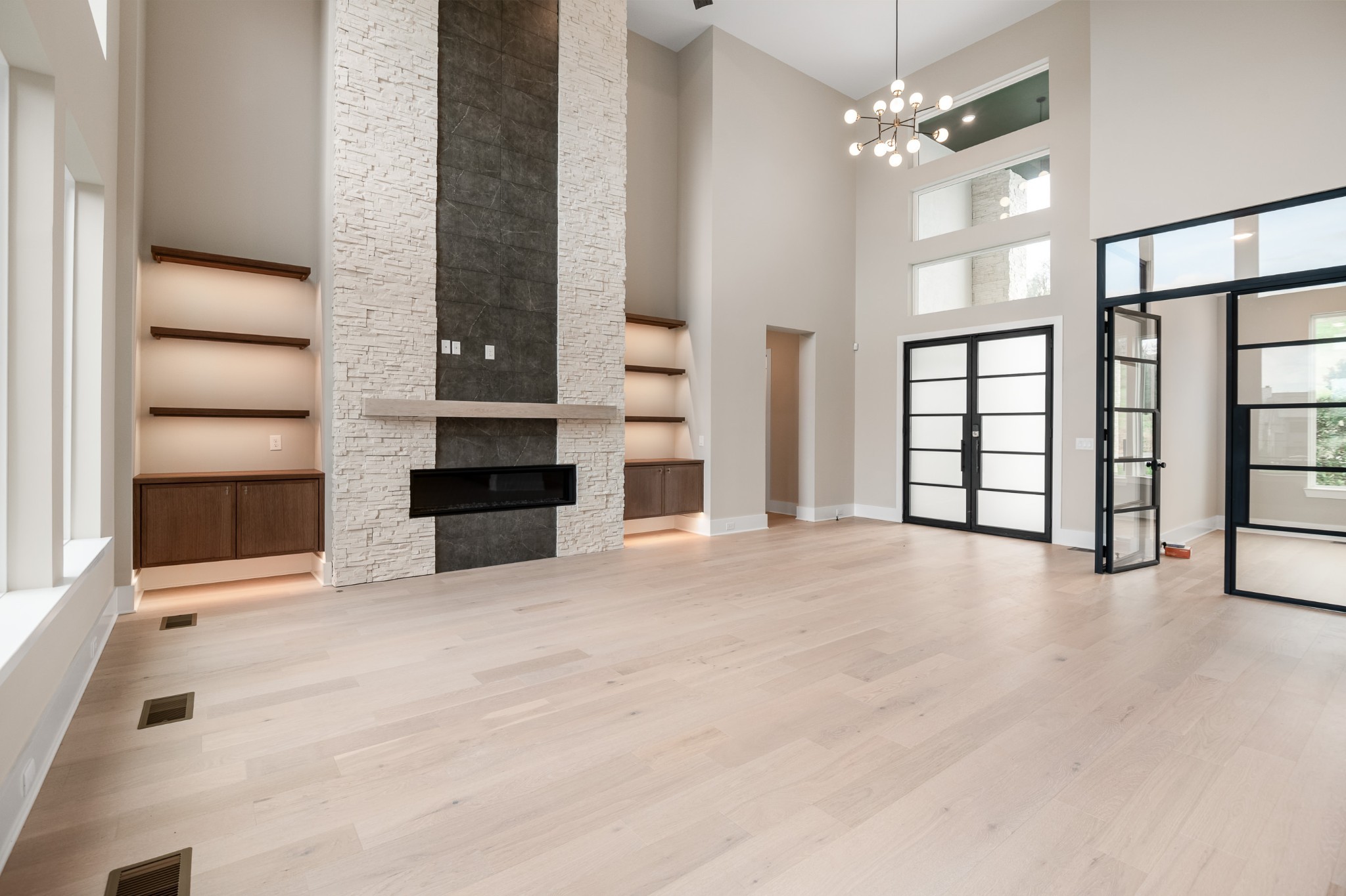 1764 Dean Road Thompson's Station, TN 37179 - Photo 13 of 45 wooden floor fireplace and windows in an empty room
