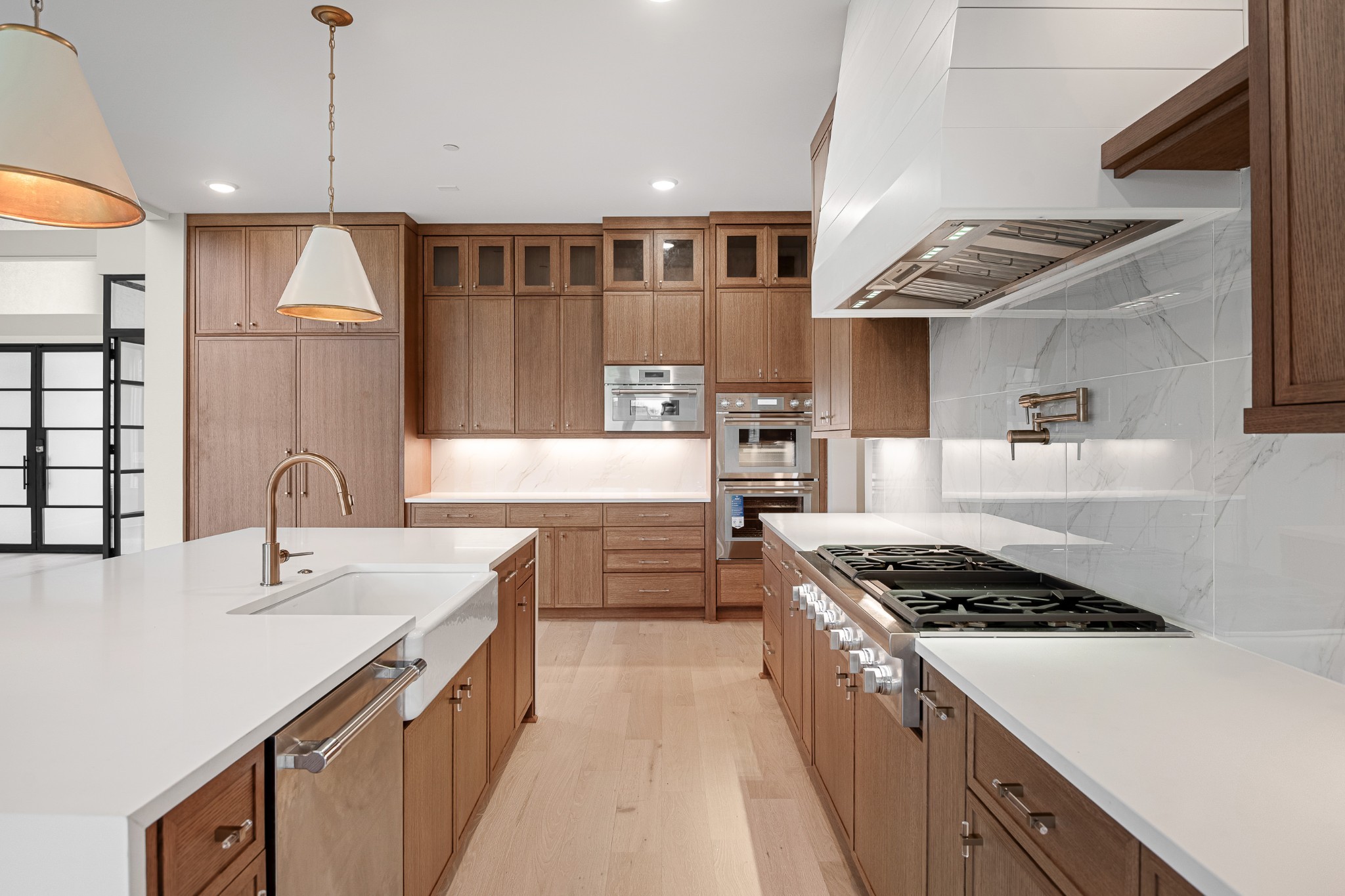1764 Dean Road Thompson's Station, TN 37179 - Photo 20 of 45 a kitchen with stainless steel appliances granite countertop a sink stove and refrigerator