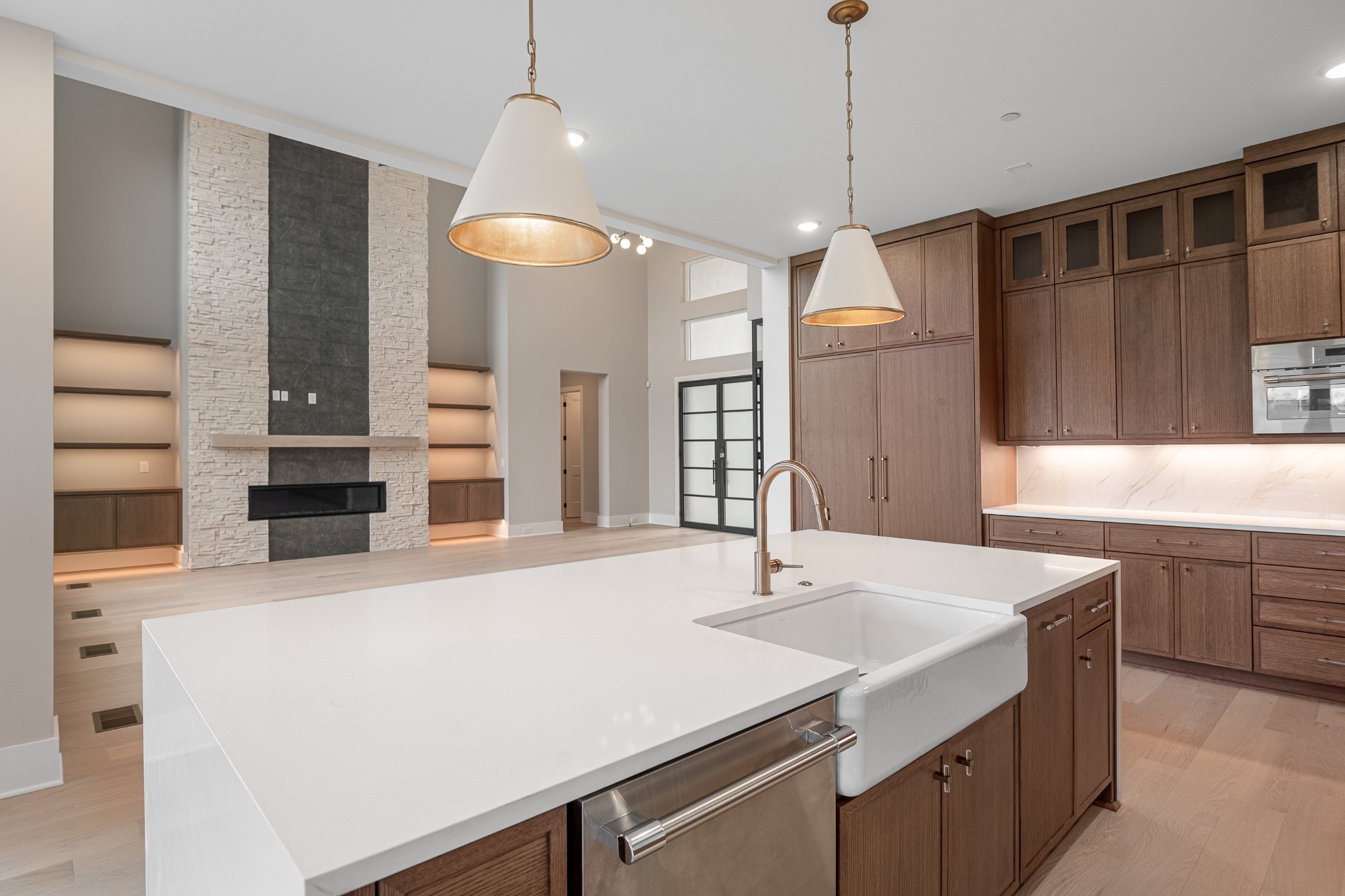 1764 Dean Road Thompson's Station, TN 37179 - Photo 21 of 45 a kitchen with a sink a island a stove and cabinets