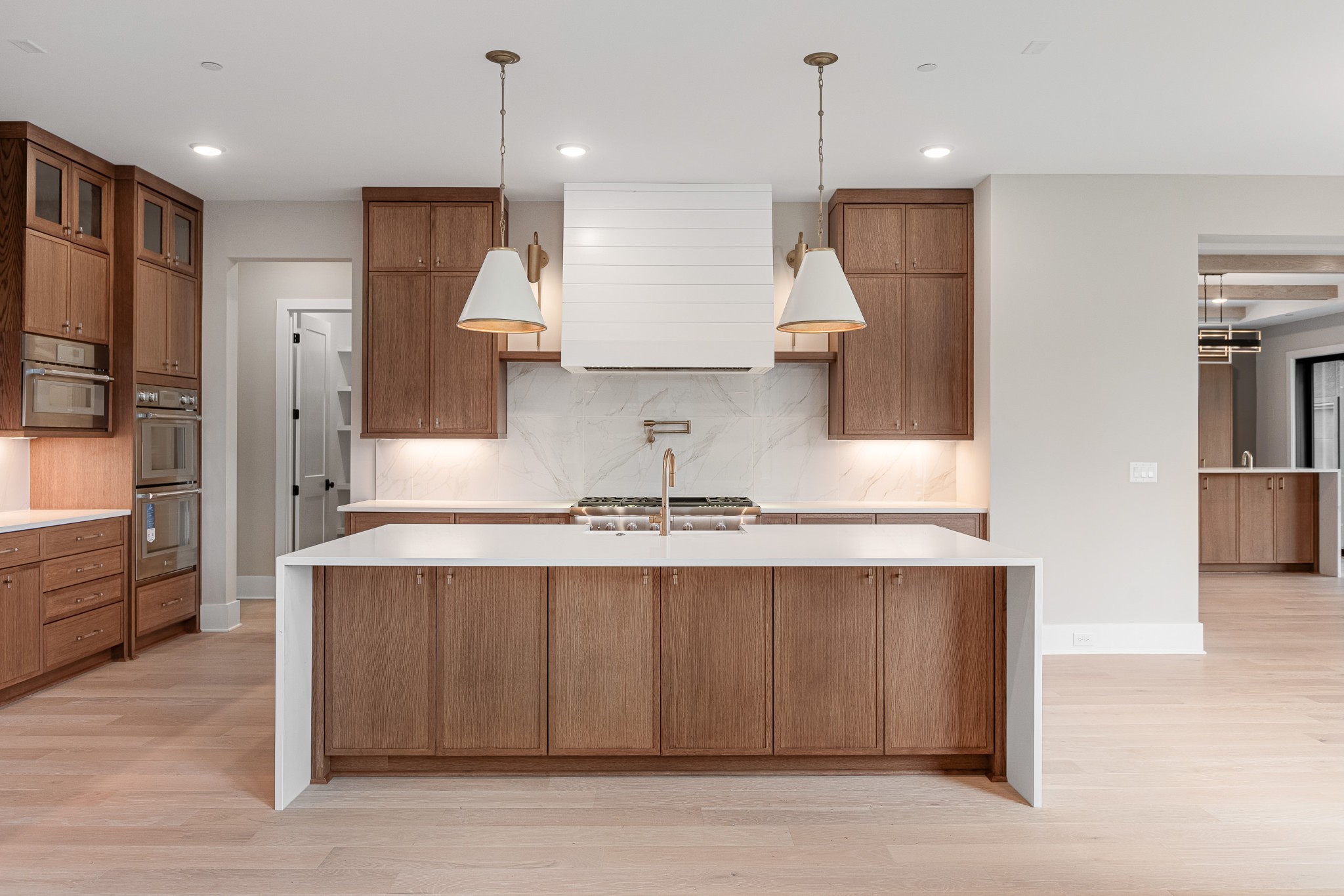 1764 Dean Road Thompson's Station, TN 37179 - Photo 22 of 45 a kitchen with kitchen island a counter top space a sink stainless steel appliances and cabinets