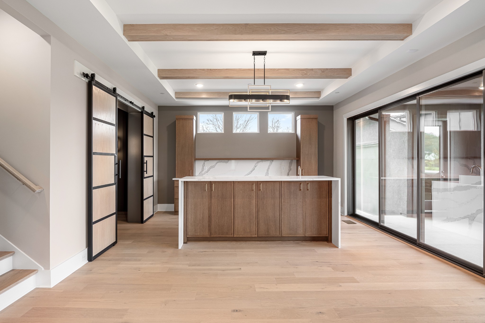 1764 Dean Road Thompson's Station, TN 37179 - Photo 27 of 45 wooden floor in an empty room with a kitchen
