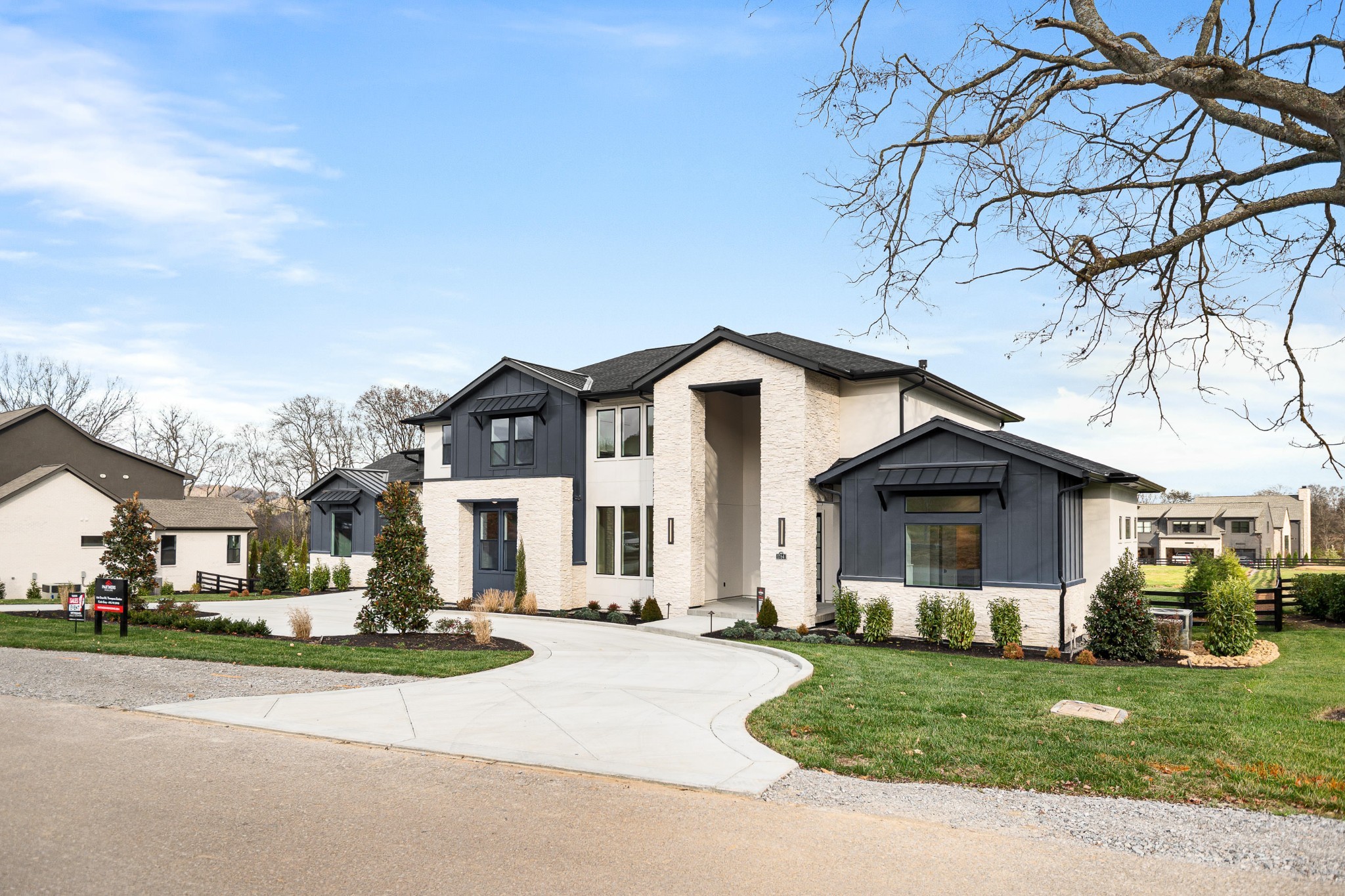 1764 Dean Road Thompson's Station, TN 37179 - Photo 6 of 45 a front view of a house with a yard and garage