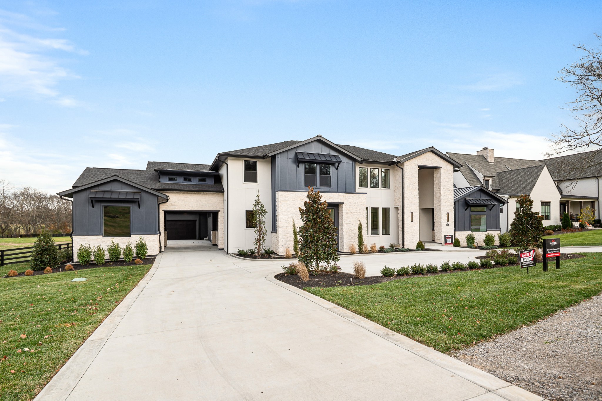 1764 Dean Road Thompson's Station, TN 37179 - Photo 7 of 45 a front view of a house with a yard and garage