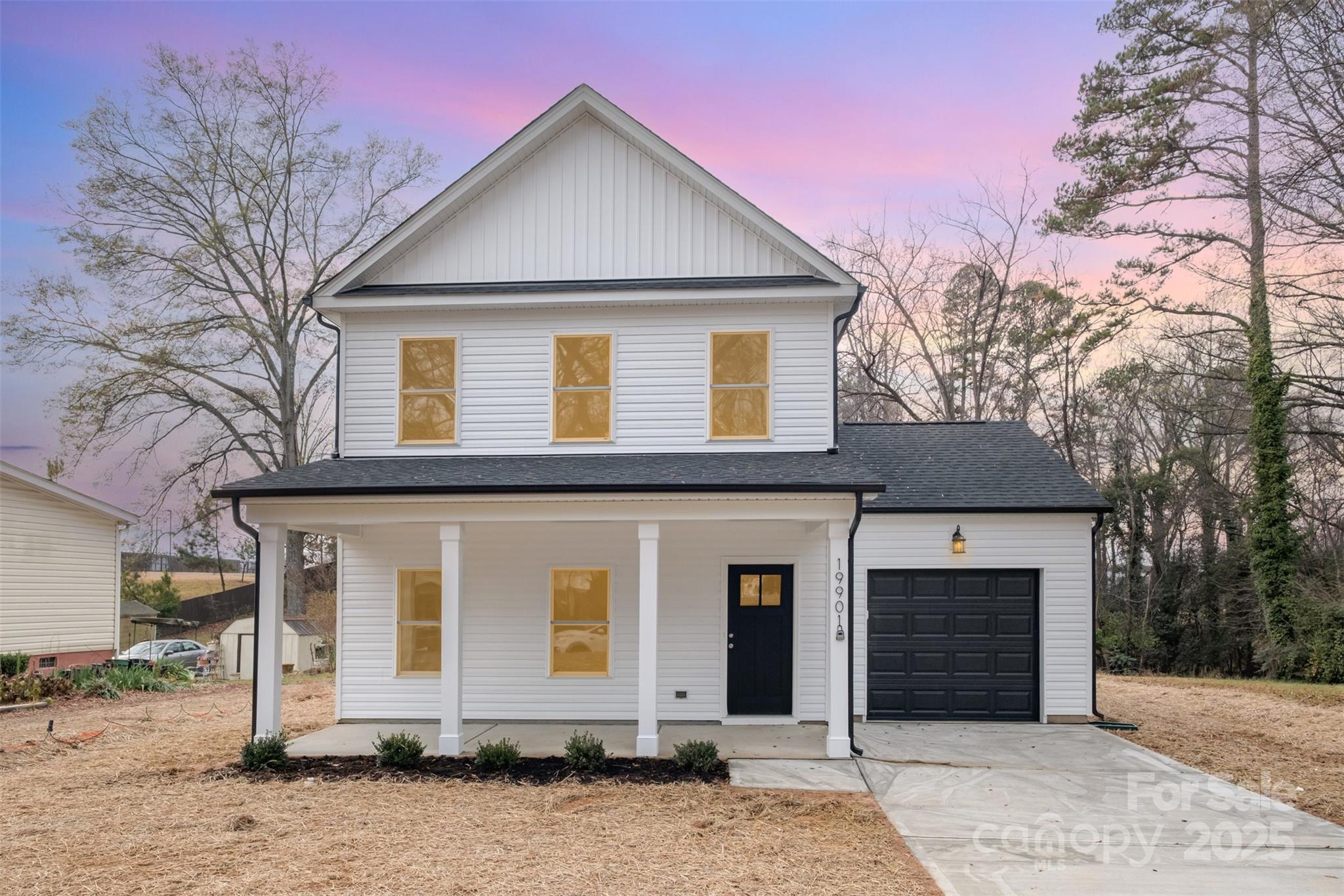 19901 Burton Lane Cornelius, NC 28031 - Photo 1 of 28 a front view of a house with yard