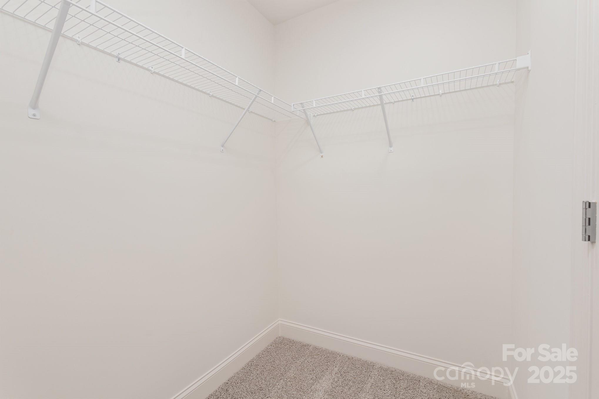 19901 Burton Lane Cornelius, NC 28031 - Photo 16 of 28 a view of a room with racks on the wall