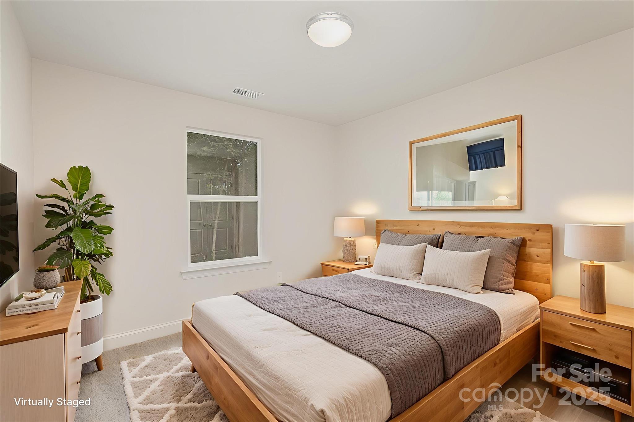 19901 Burton Lane Cornelius, NC 28031 - Photo 19 of 28 a bedroom with bed and a window